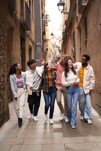 Friends walking down an alley
