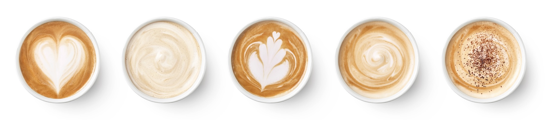Top view of 5 cups of coffee/lattes with different designs on each