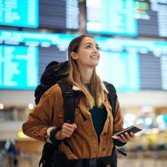 Happy traveler at airport
